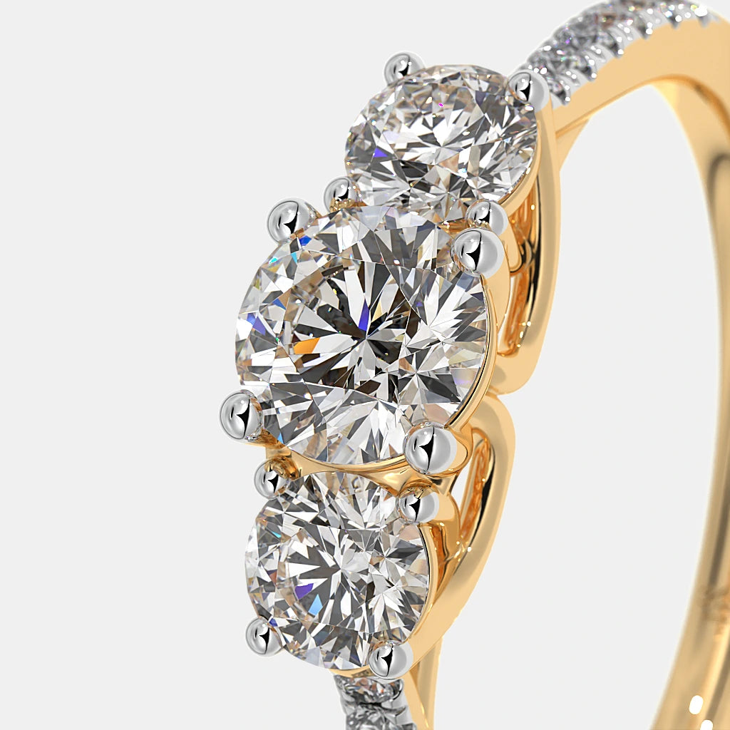 The Joel Three Stone Solitaire Ring